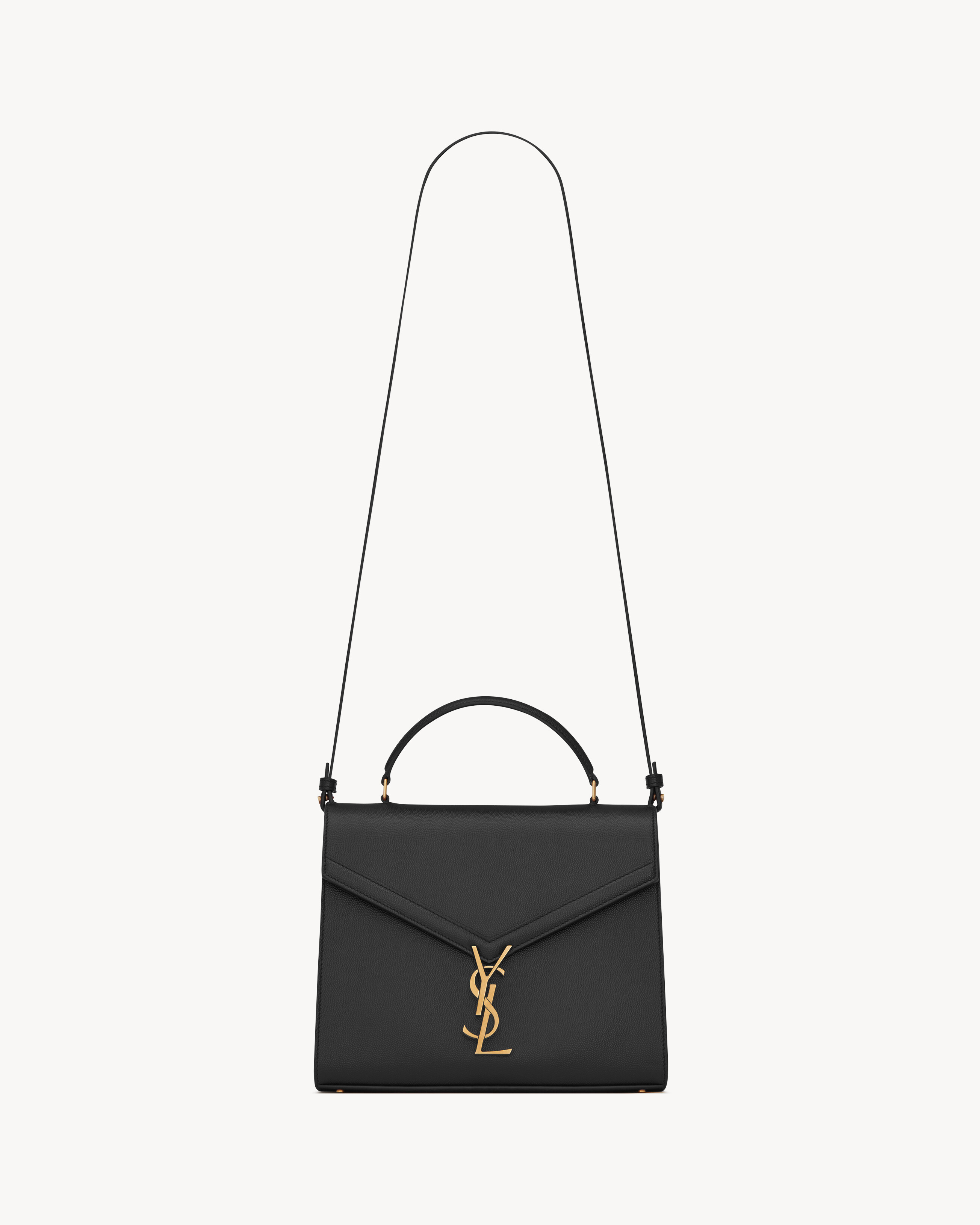 CASSANDRA Medium top handle bag in grain de poudre embossed leather