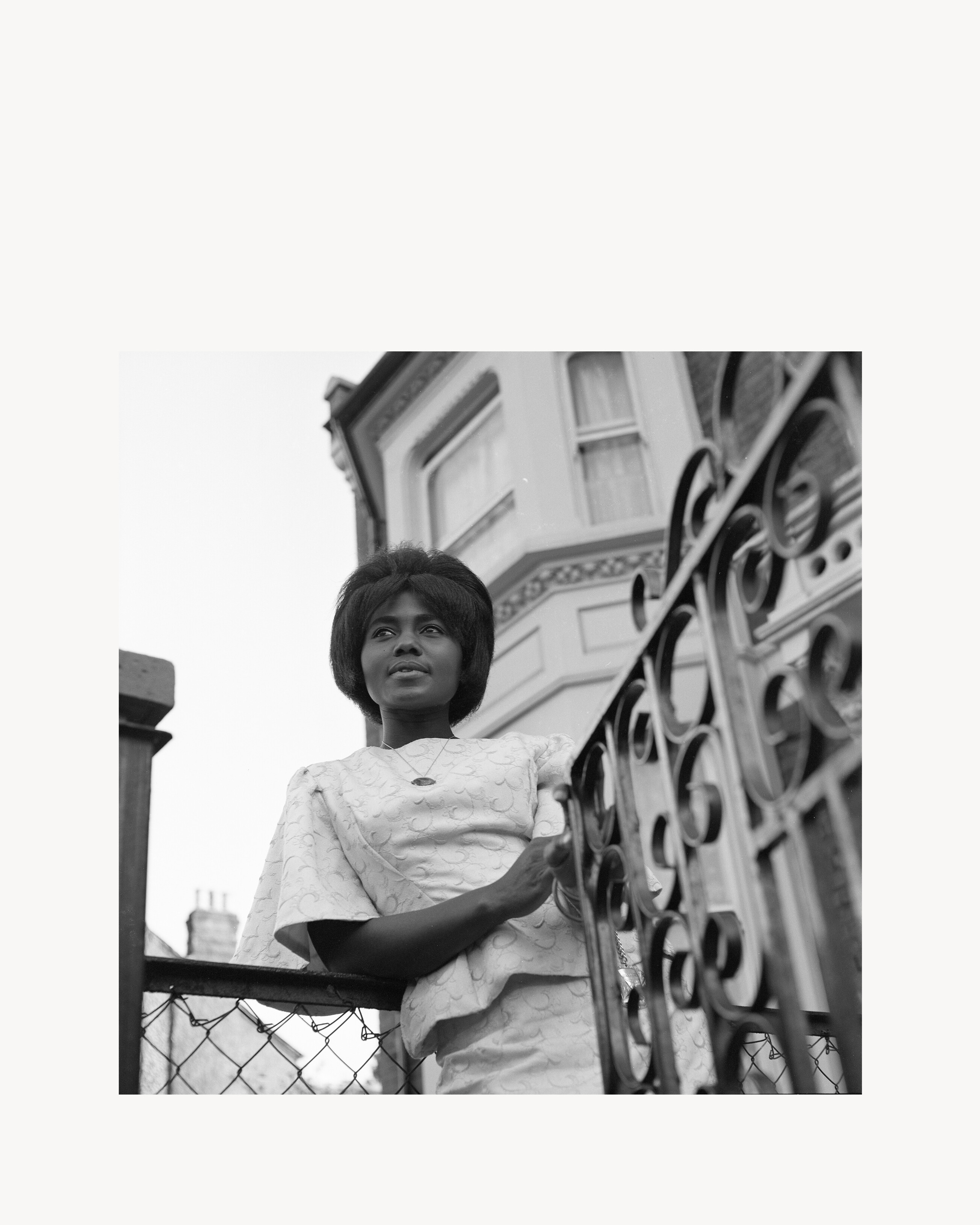 Sarah Mills Okaikoi in front of her home in Balham, South London, c. 1965