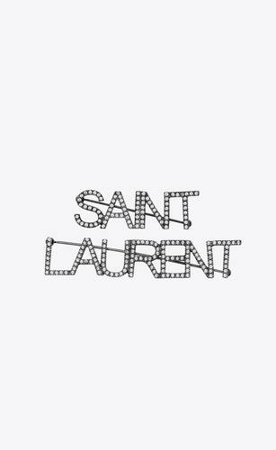saint laurent brooches in brass and crystal
