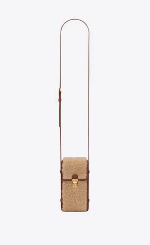 tuc phone pouch with strap in shearling and vegetable-tanned leather