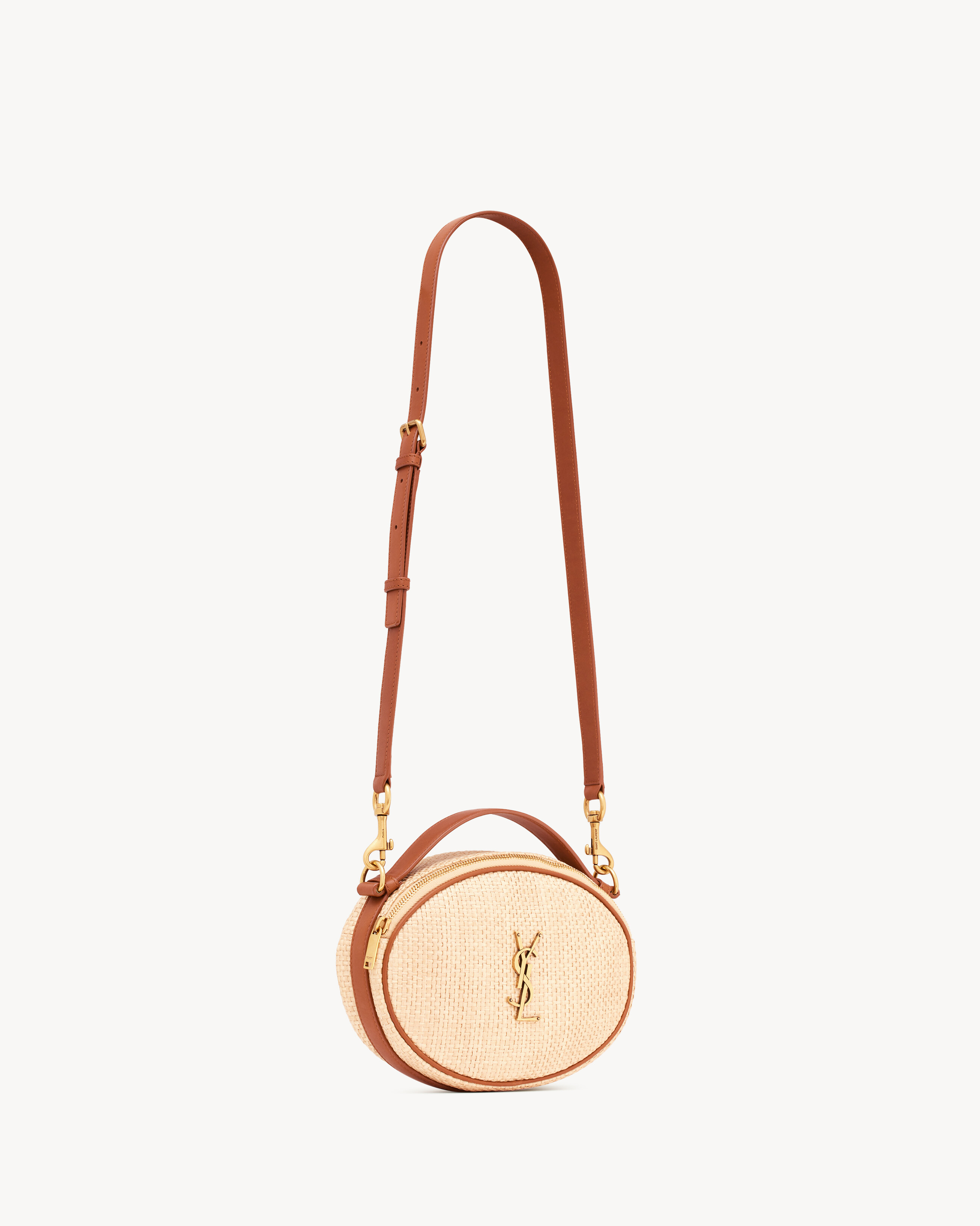 Camera bag in raffia and vegetable-tanned leather