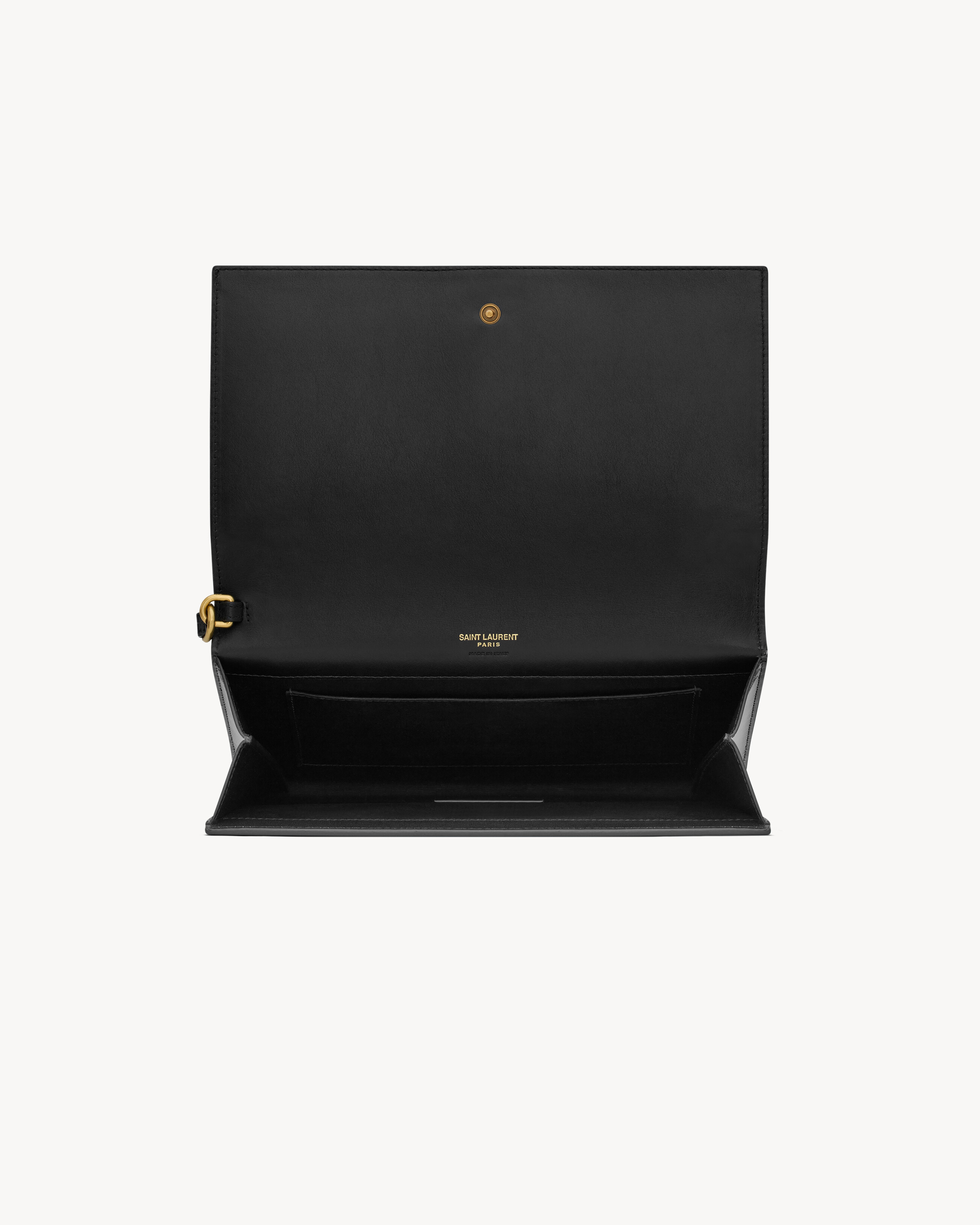 CASSANDRE flap pouch in shiny leather