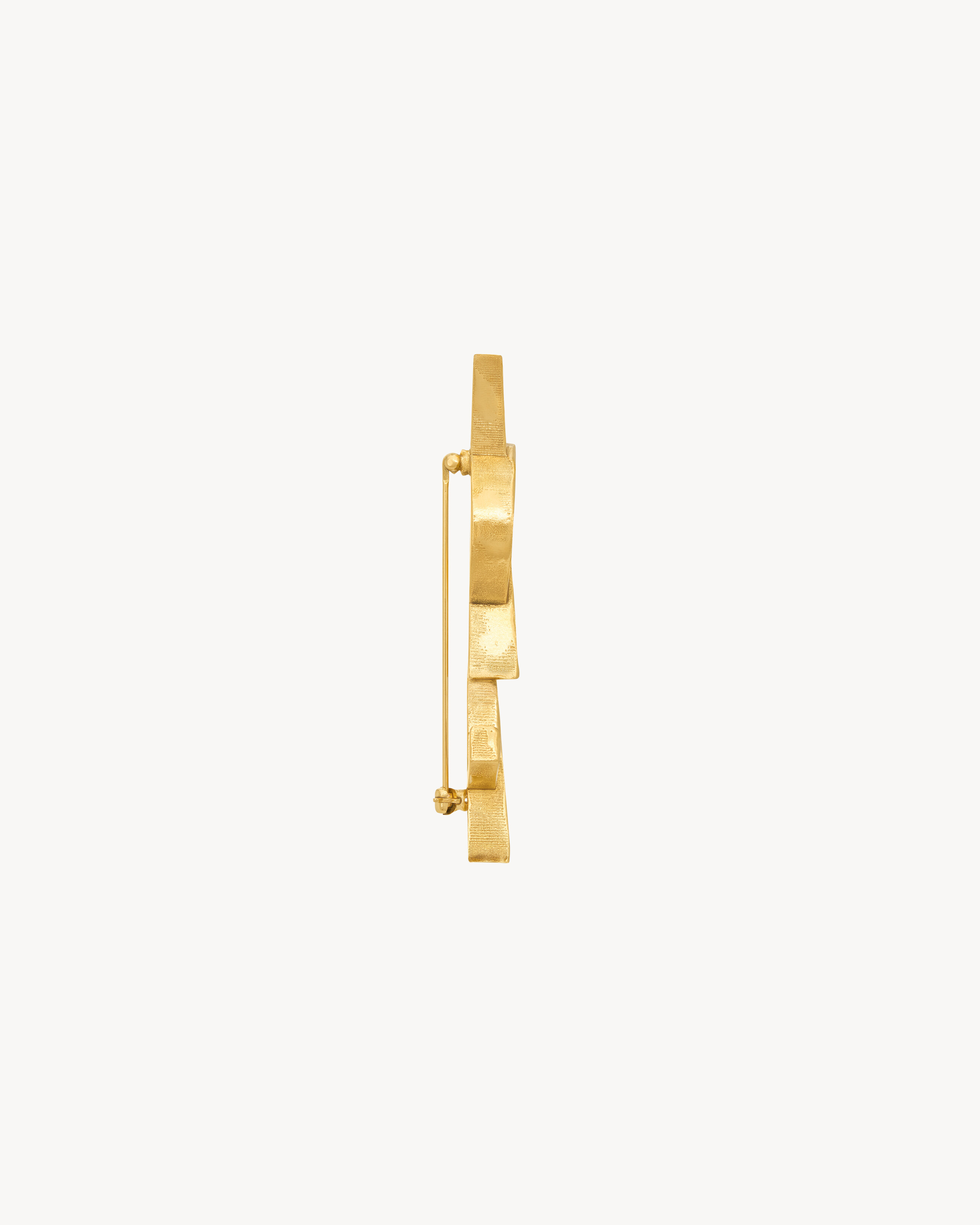 CASSANDRE brooch in metal