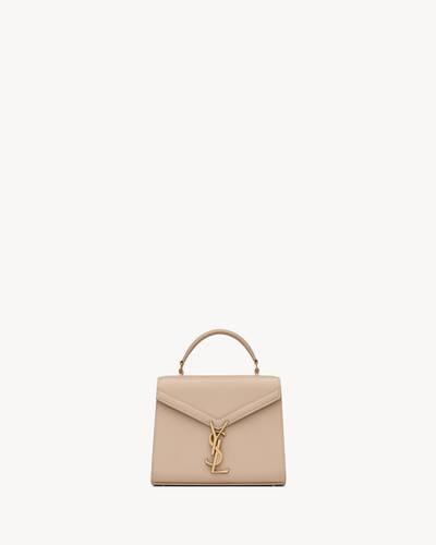 cassandra mini top handle bag in grain de poudre embossed leather