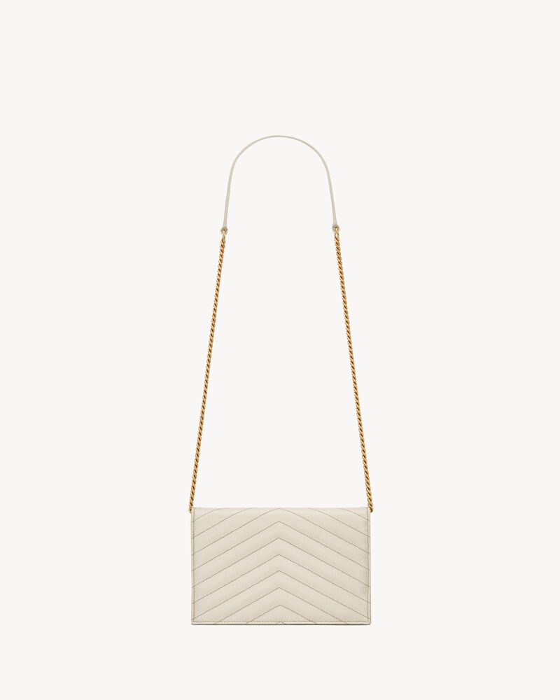 CASSANDRE ENVELOPE CHAIN WALLET IN GRAIN DE POUDRE LEATHER