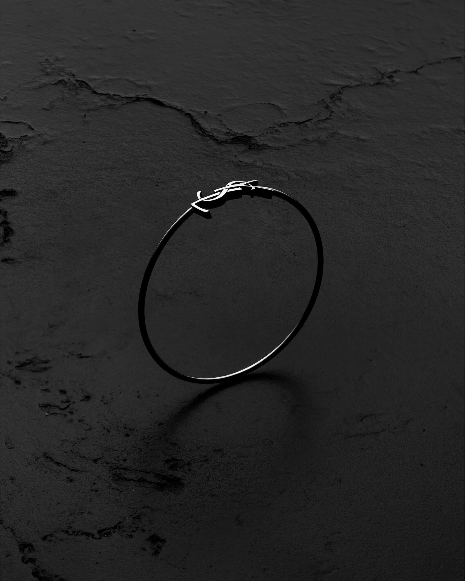 CASSANDRE hinged bangle in 18K grey gold in Silver | Saint Laurent | YSL US