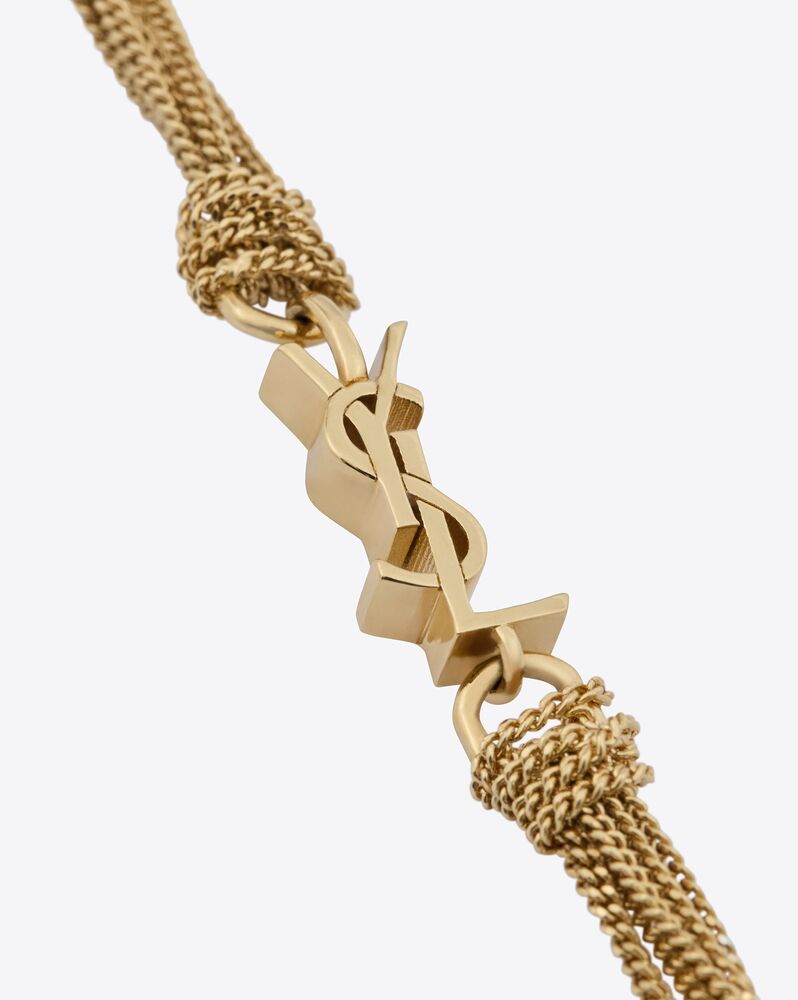 CASSANDRE tassel bracelet in metal