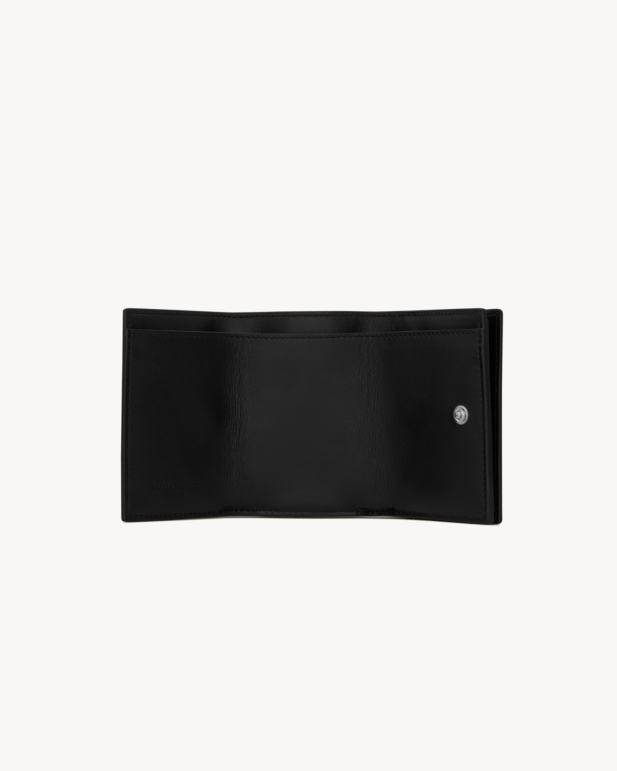 Tiny wallet in grain de poudre embossed leather