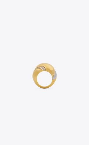 anillo en forma de torbellino de metal con cristales