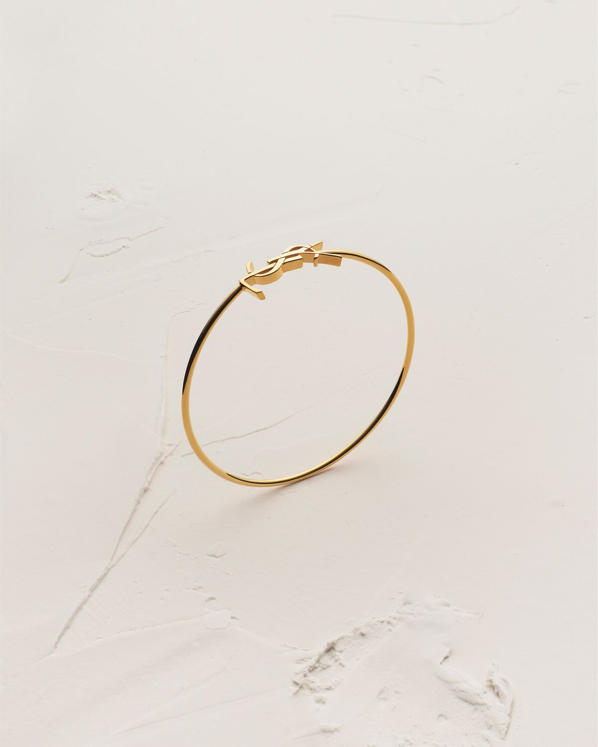 CASSANDRE bangle in 18K yellow gold