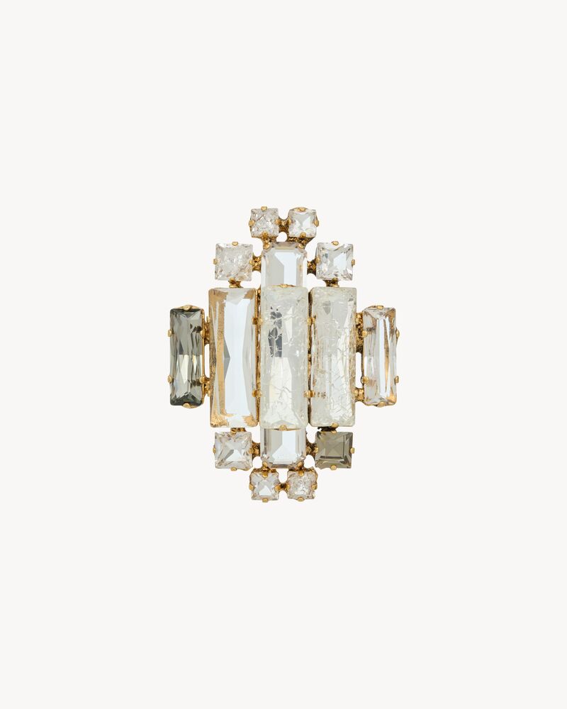 Broche médaillon en métal et cristal