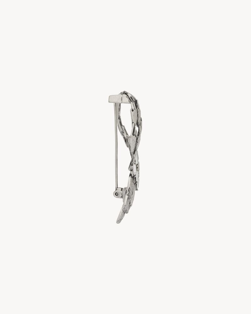 CRYSTAL WATERFALL BROOCH IN METAL