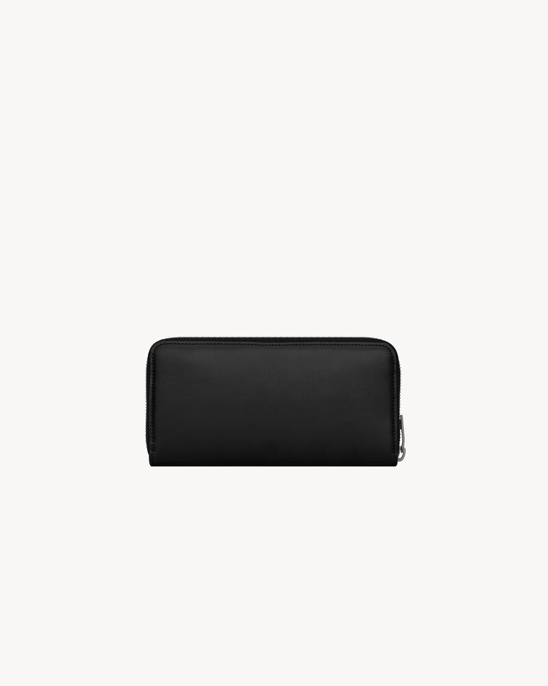 TINY CASSANDRE zip-around wallet in matte leather