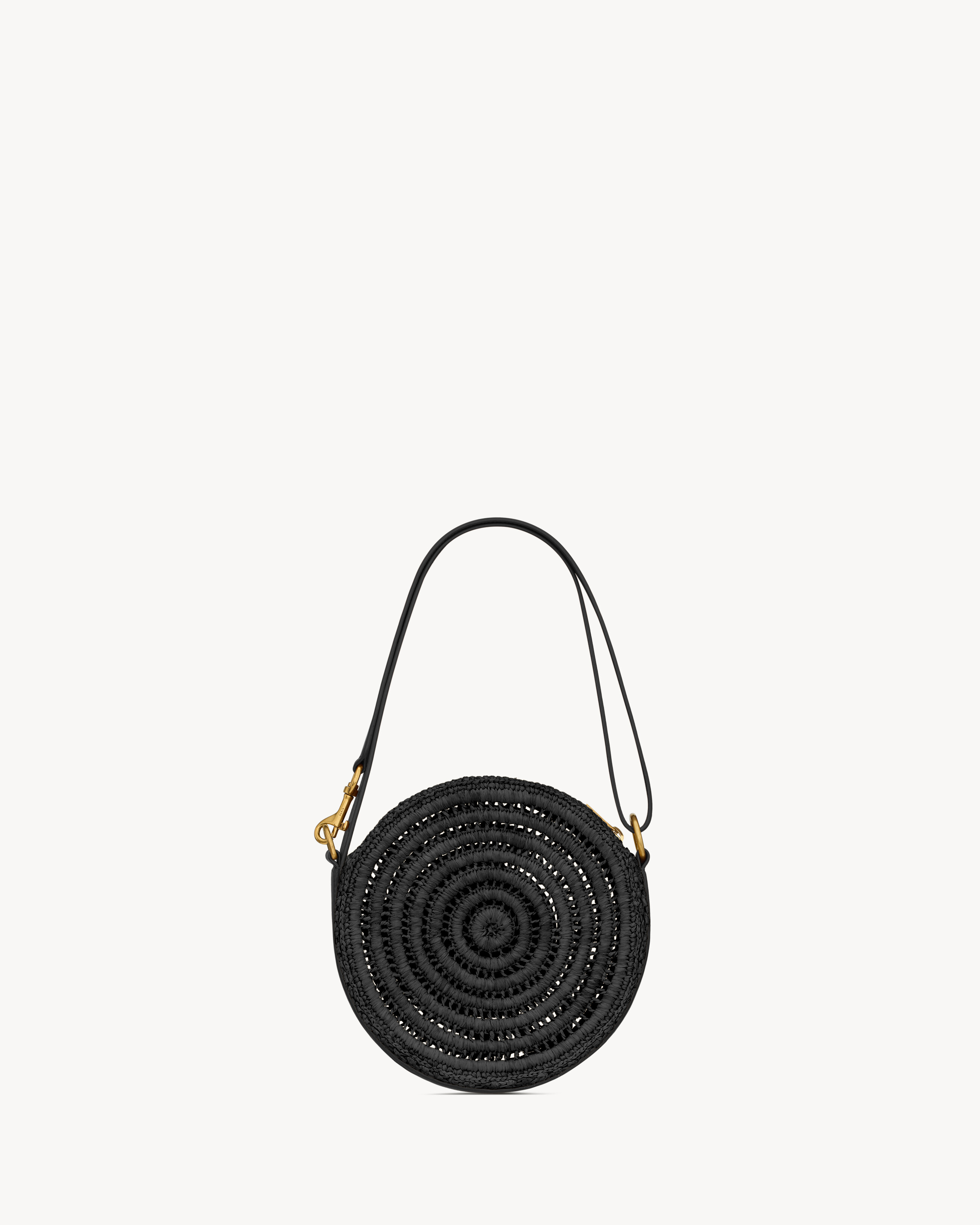 Round bag in raffia and vegetable-tanned leather