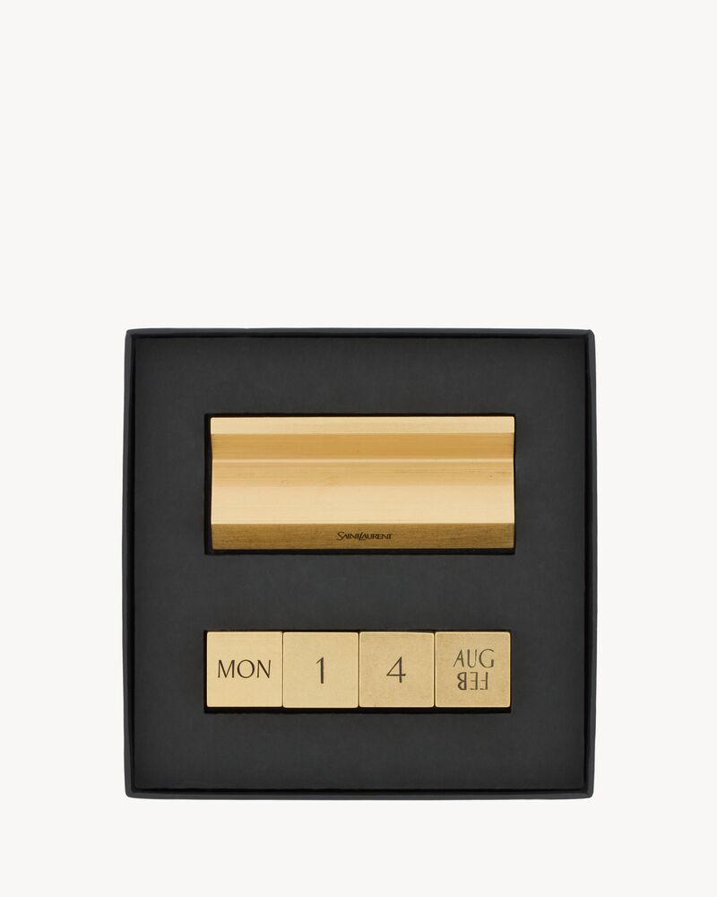 SAINT LAURENT PERPETUAL CALENDAR IN BRASS