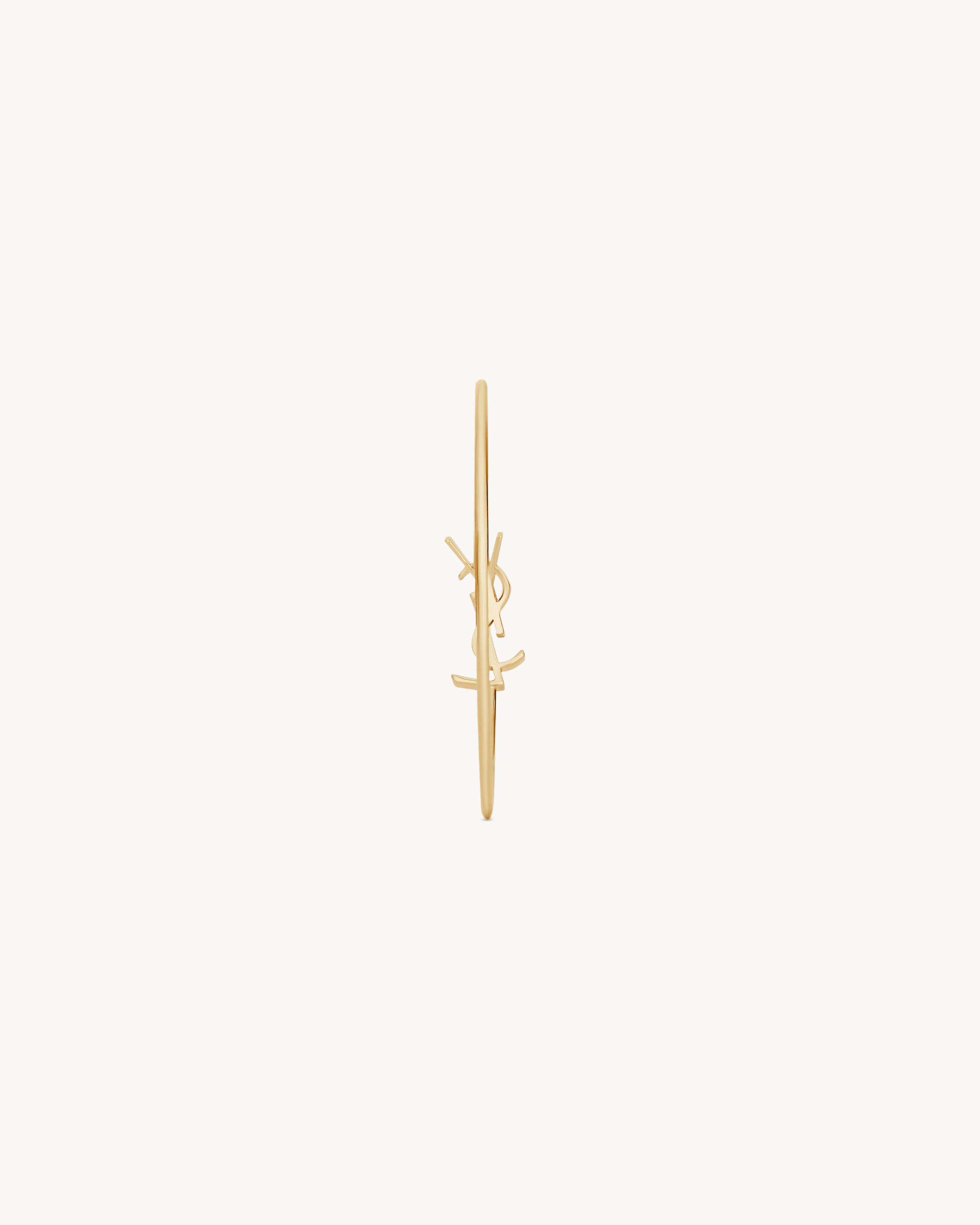 CASSANDRE bangle in 18K yellow gold