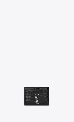 크로커다일 무늬가 새겨진 블랙 가죽 소재의 모노그램 생 로랑 신용카드 케이스