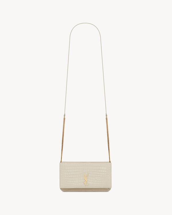CASSANDRE phone holder in SHINY crocodile-embossed leather