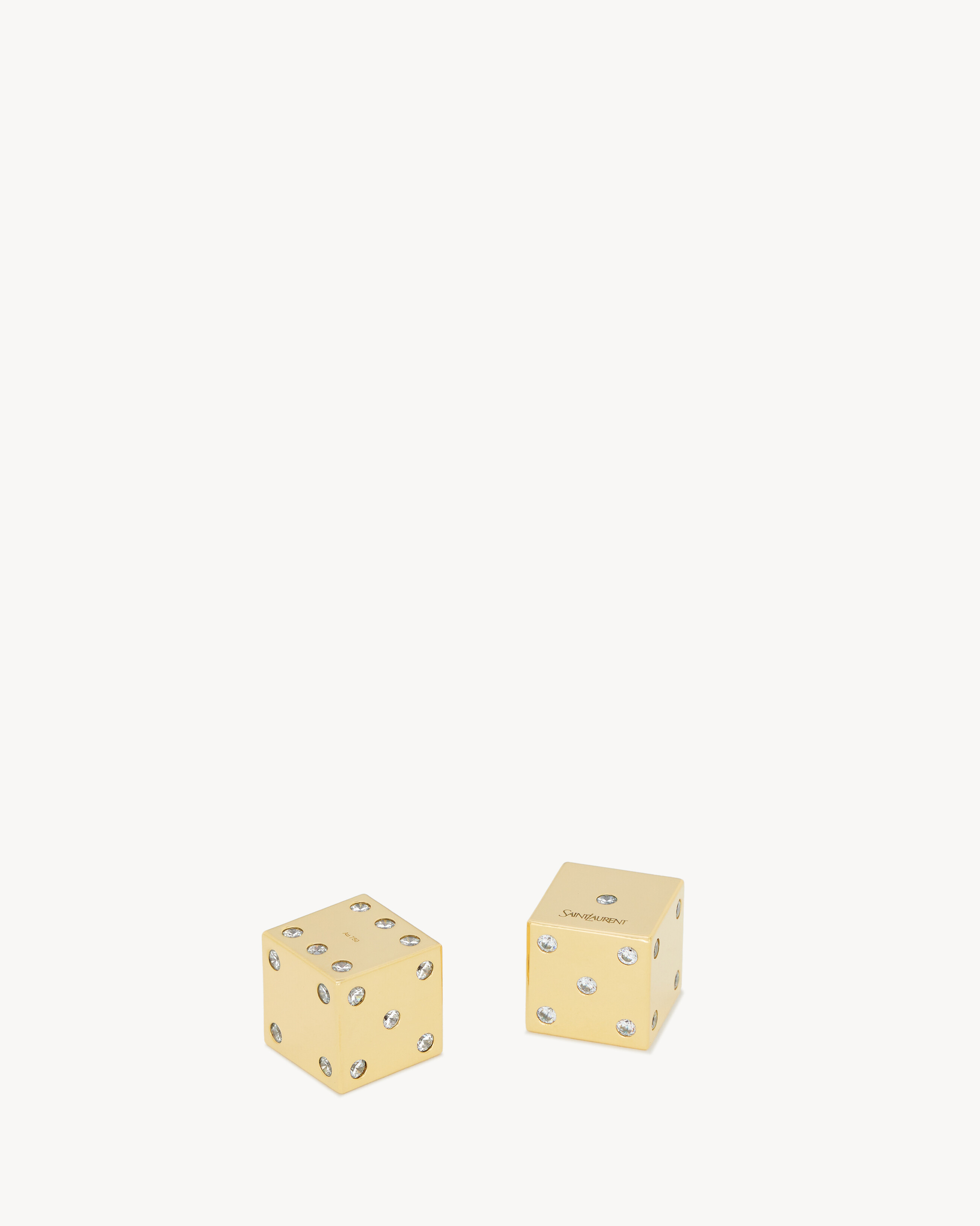 Diamond-embellished dice in 18K yellow gold