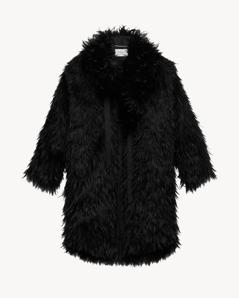 coat in silk organza and feathers