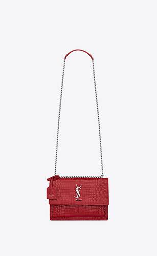 mittlere sunset tasche aus rotem glanzleder mit krokodillederprägung