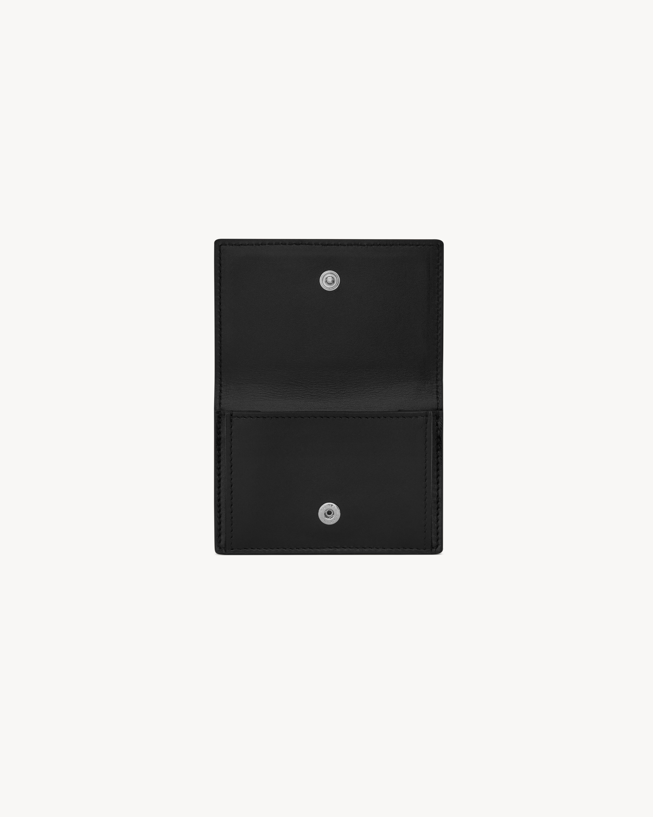 Tiny wallet in grain de poudre embossed leather