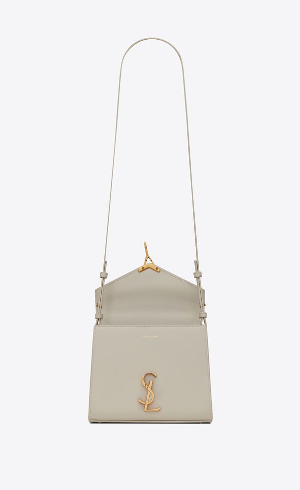 CASSANDRA Mini top handle bag in grain de poudre embossed leather