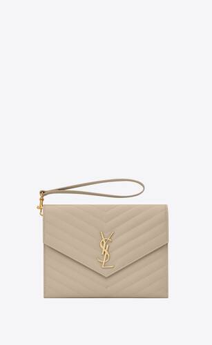 monogram clutch in quilted grain de poudre embossed leather