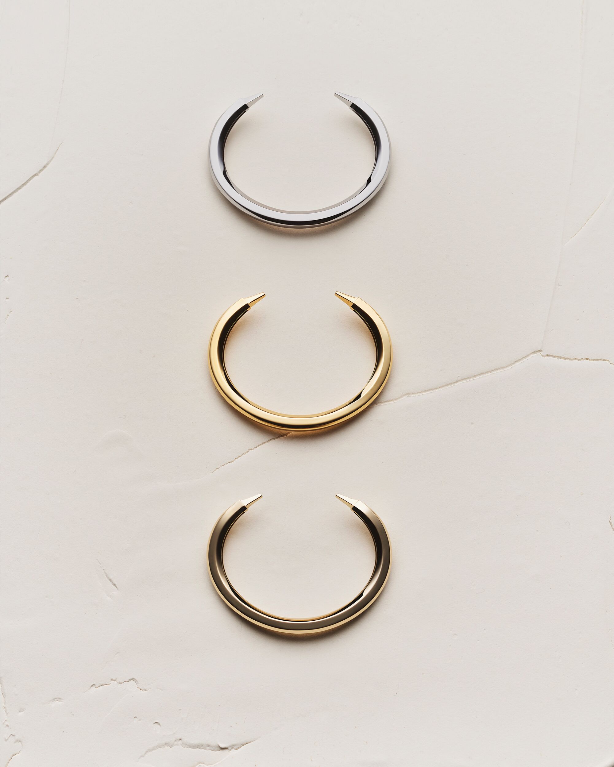 Spiky bracelets in 18K grey gold, yellow, gold and pale gold