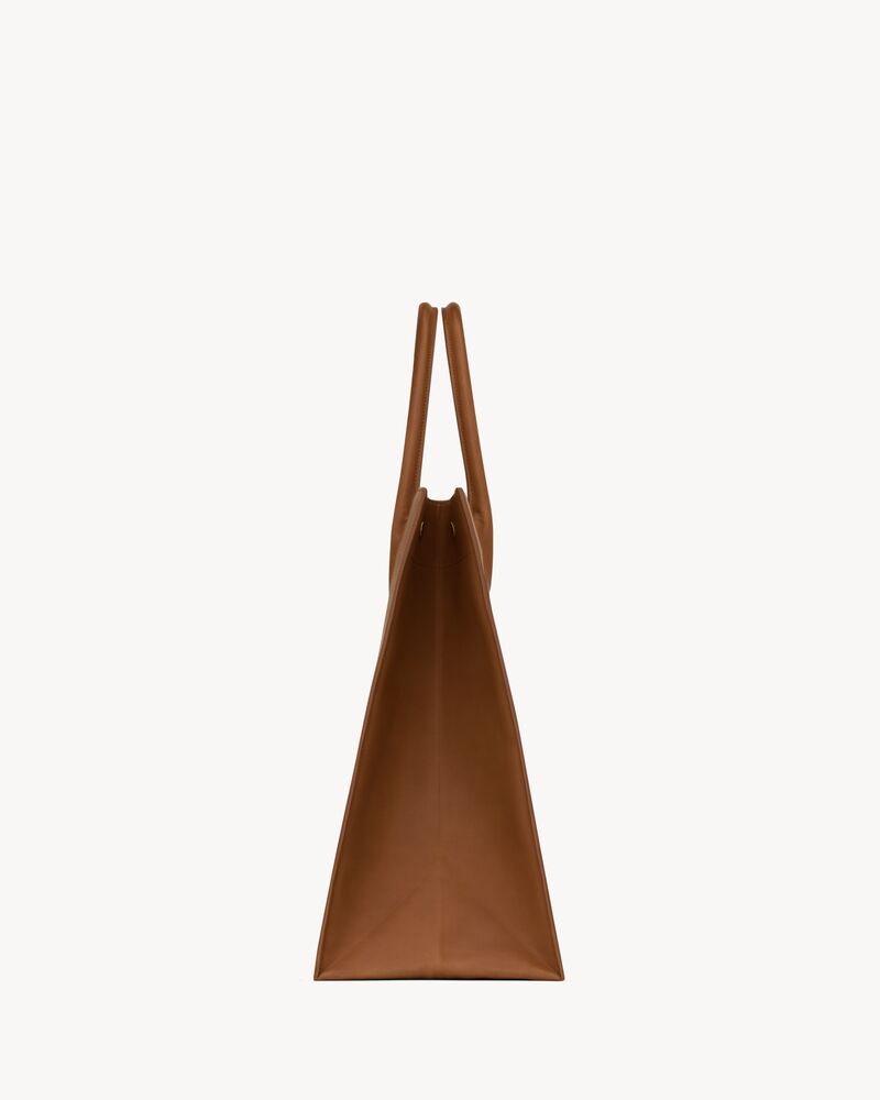 Rive gauche in raffia and vegetable-tanned leather