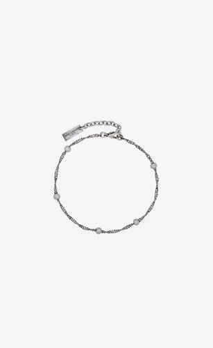 ball and intertwined chain bracelet in metal