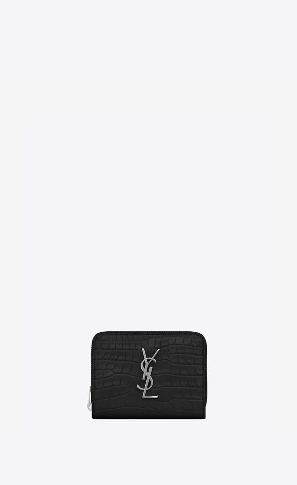 cassandre saint laurent kompakte brieftasche mit reißverschluss aus schwarzem, glänzendem leder mit krokodilprägung