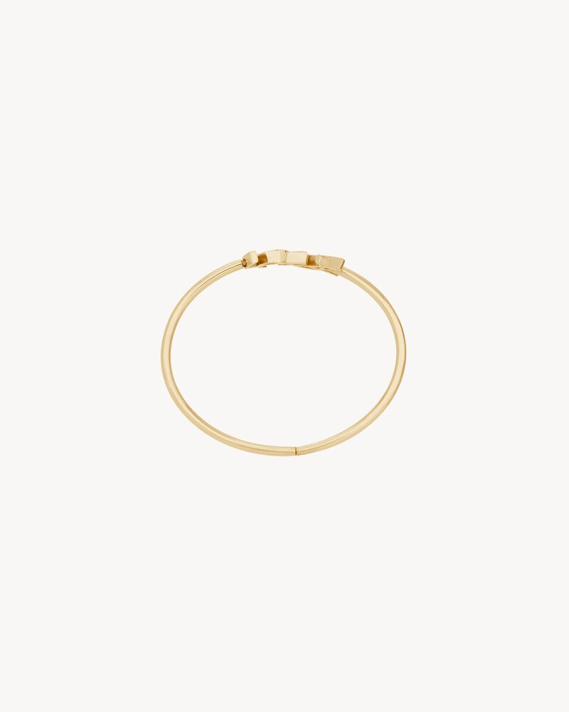 CASSANDRE hinged bangle in 18K yellow gold in Gold | Saint Laurent