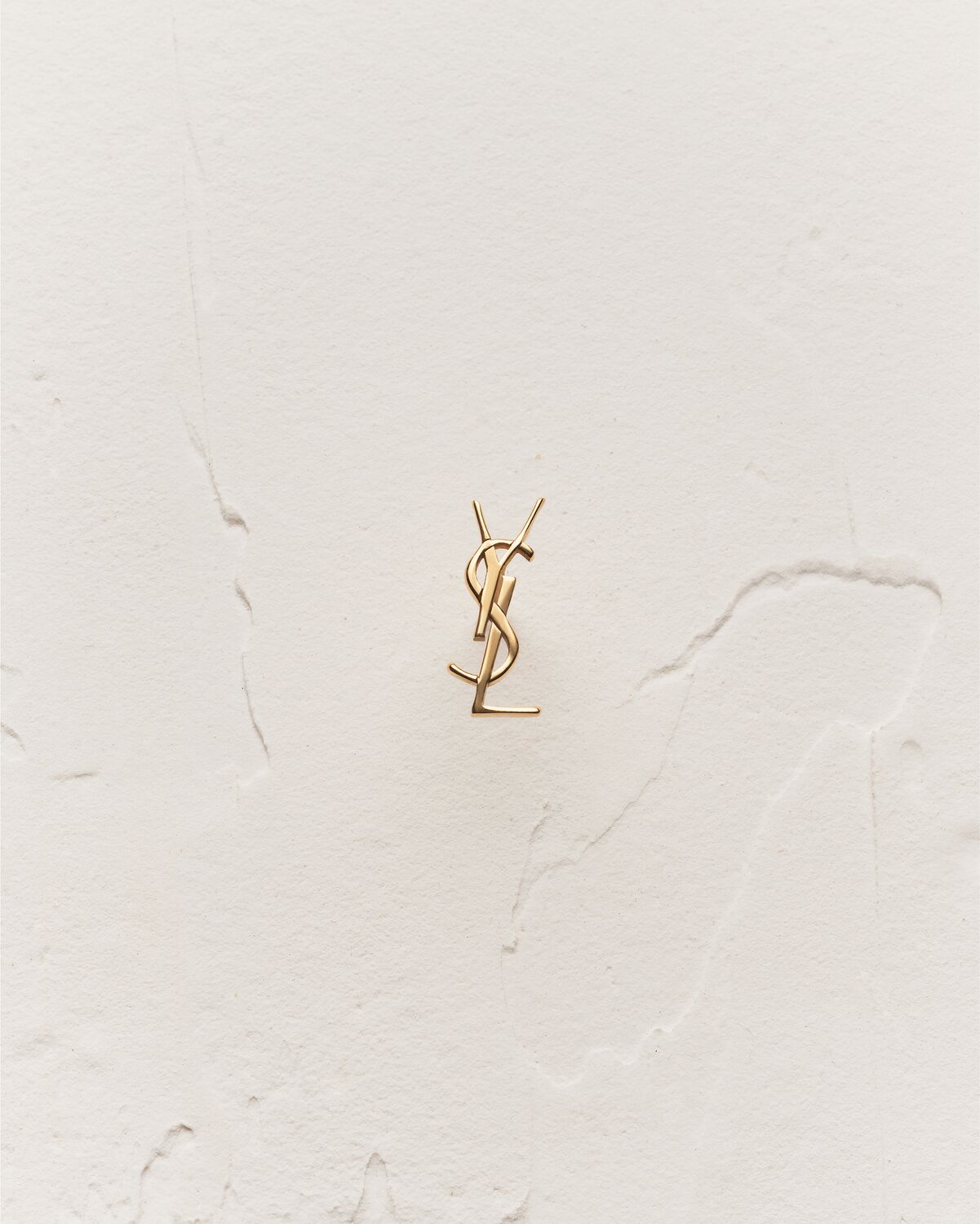 CASSANDRE stud earring in 18K yellow gold Saint Laurent