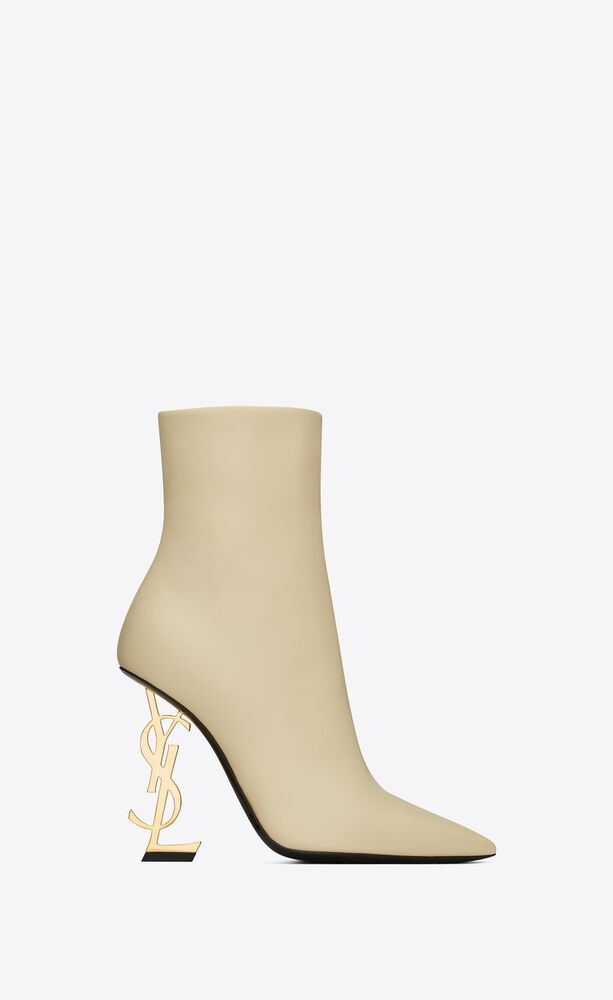 grass Booth Counsel Opyum ankle booties in smooth leather with a gold-tone heel | Saint Laurent  | YSL.com