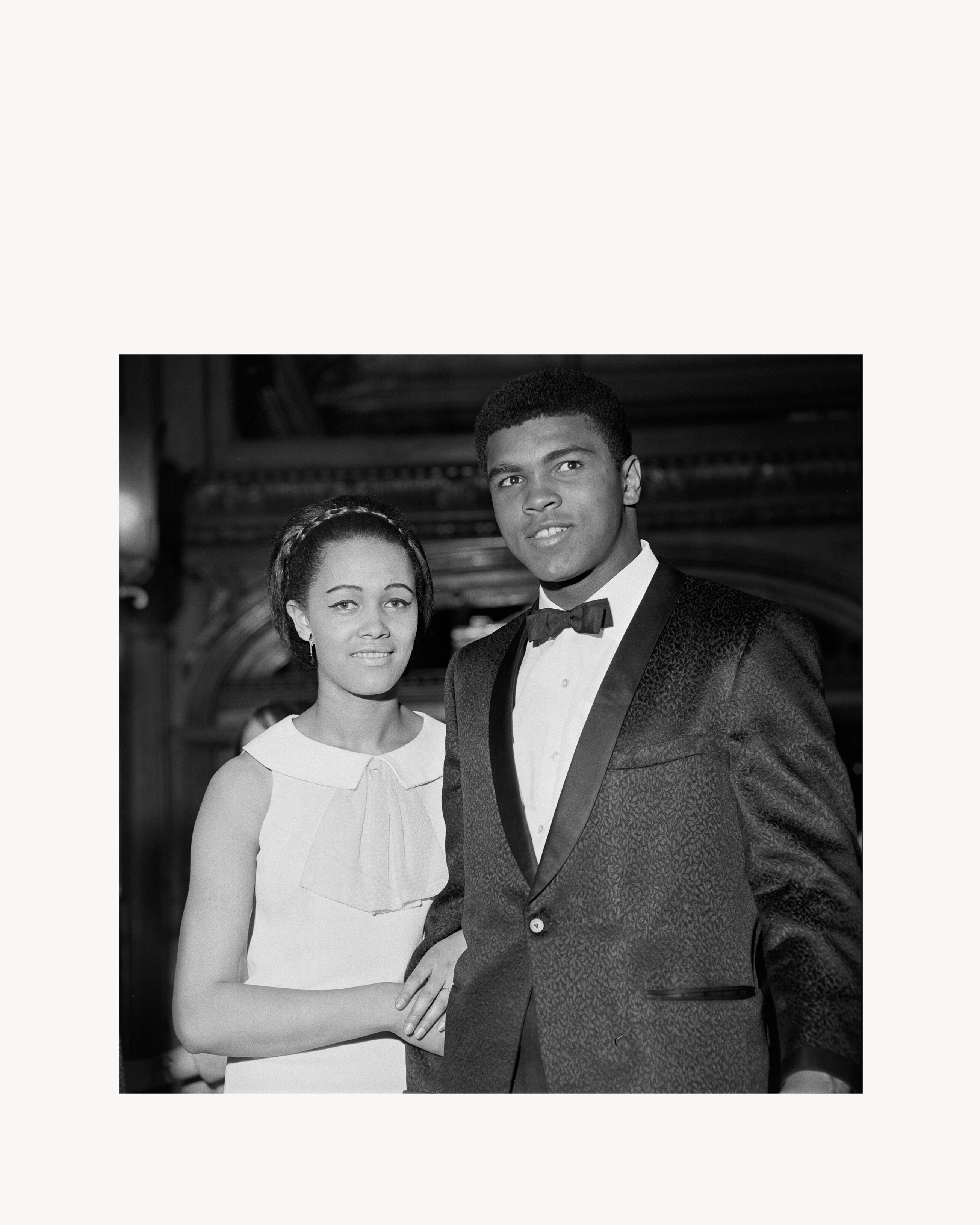 Kayla, the secretary at Drum magazine on the arm of Muhammad Ali, London, August 1966