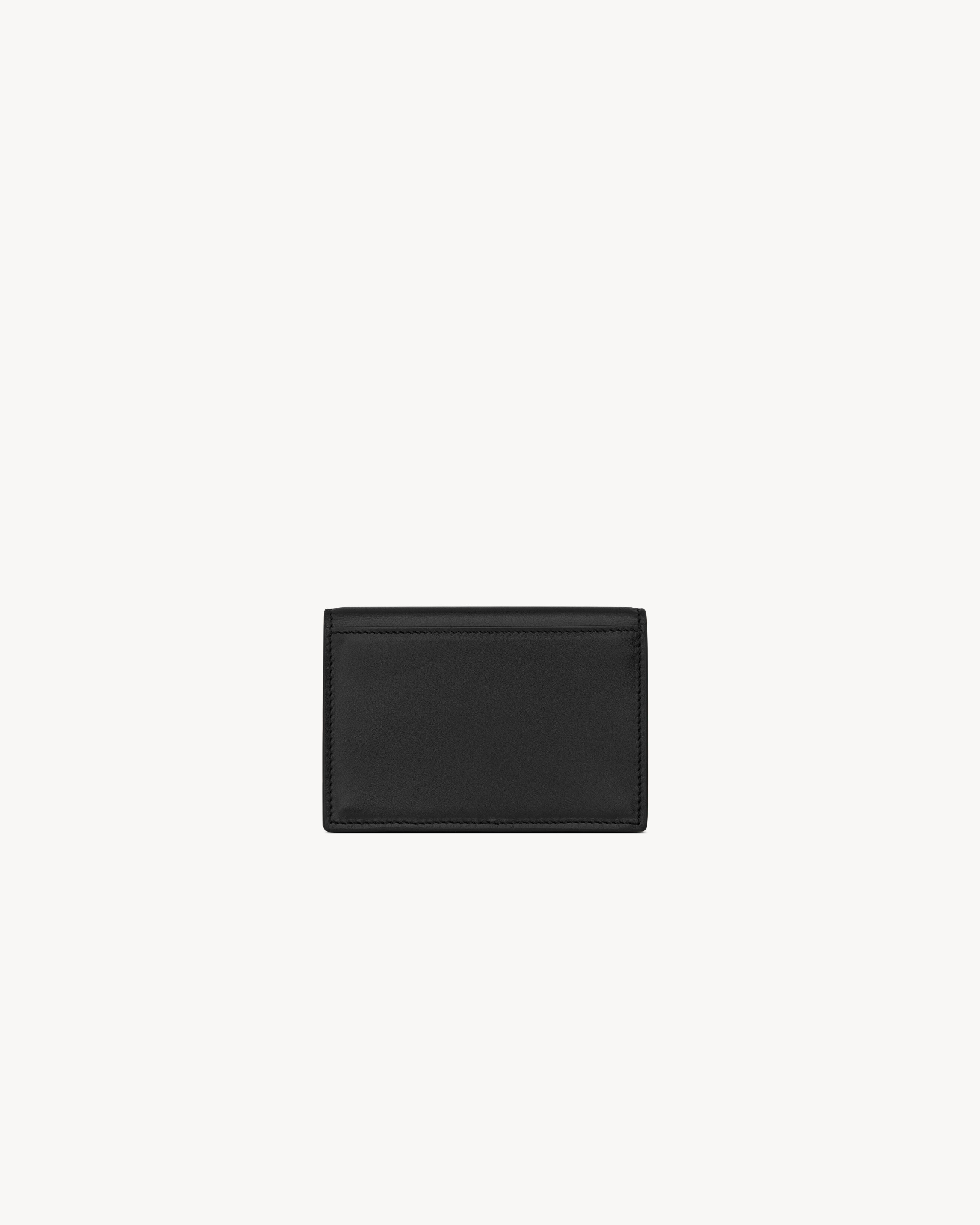 Business card holder with flap in smooth leather