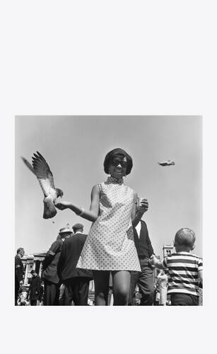 erlin ibreck, a ugandan model spotted by james barnor for drum, posing with pigeons at trafalgar square, london, c. 1966-67