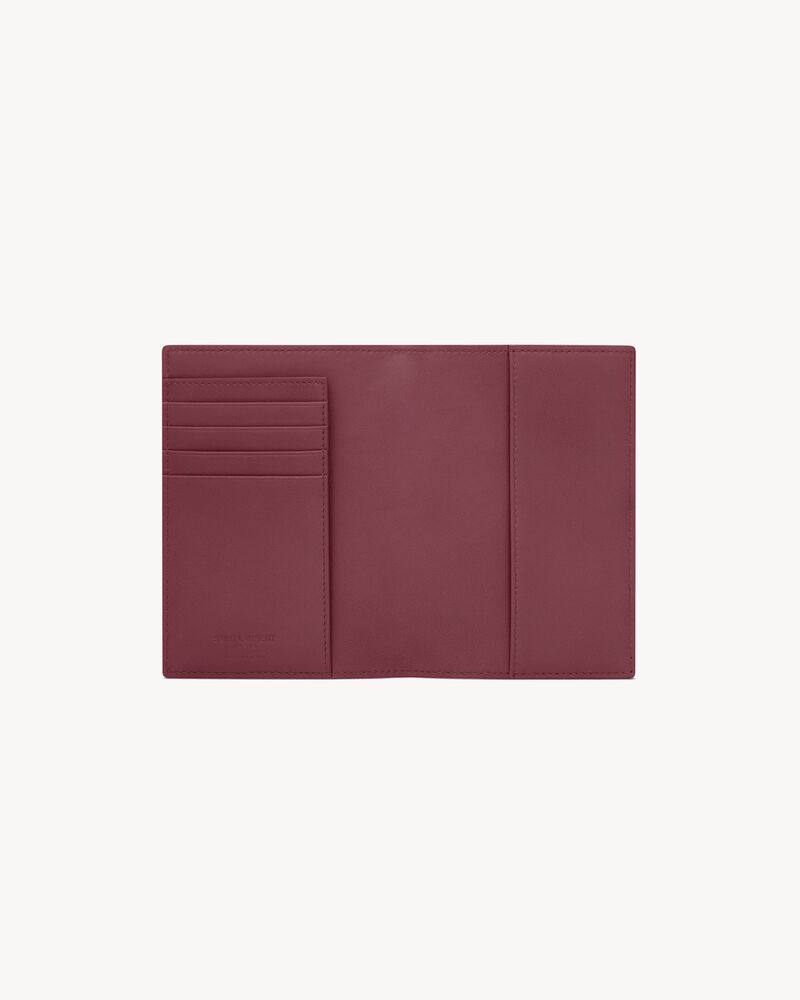SAINT LAURENT PARIS PASSPORT CASE IN shiny leather