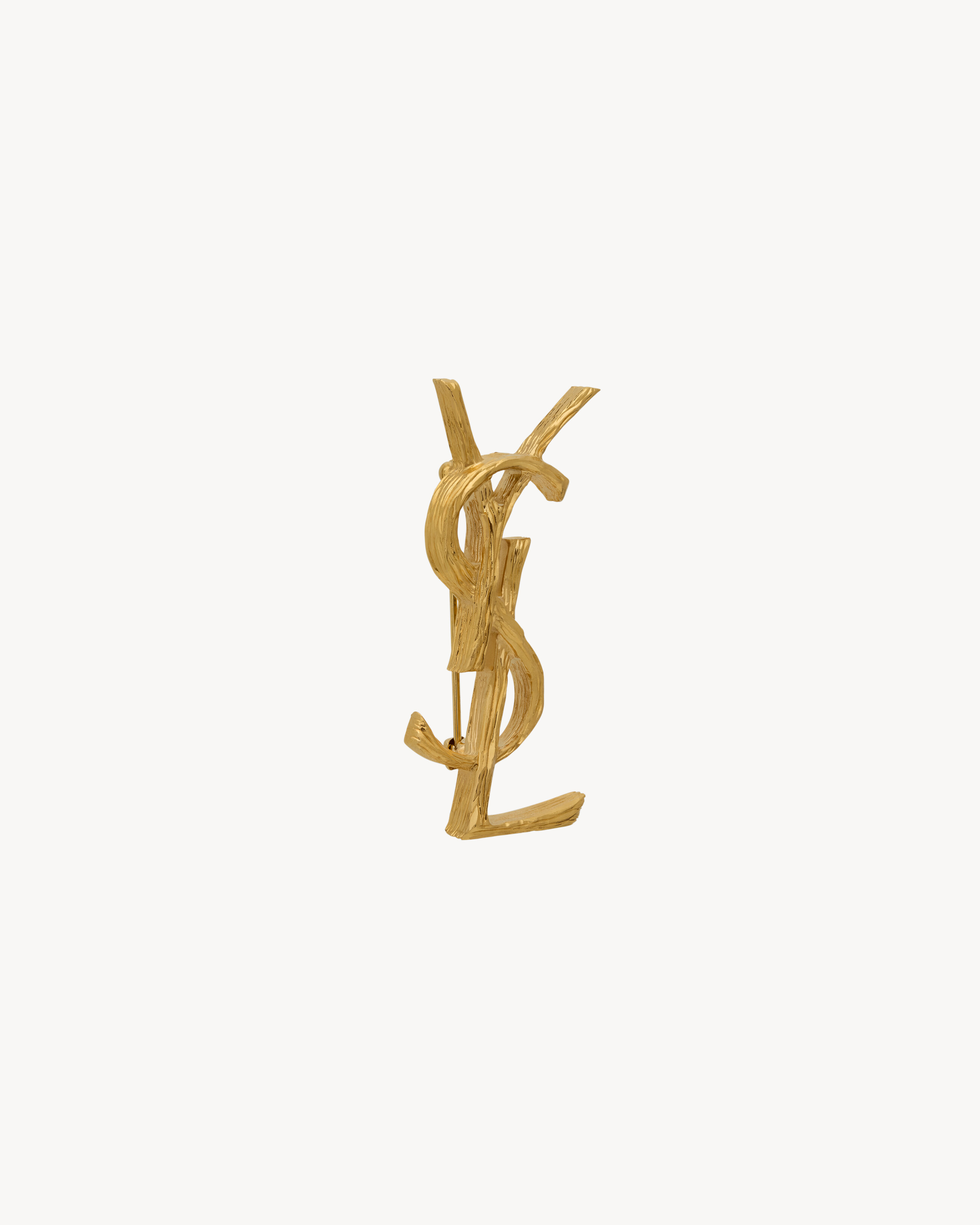 CASSANDRE brooch in metal