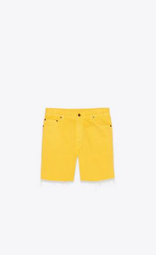 baggy shorts in bright yellow stonewash denim