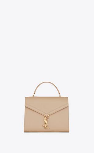 cassandra medium top handle bag in grain de poudre embossed leather