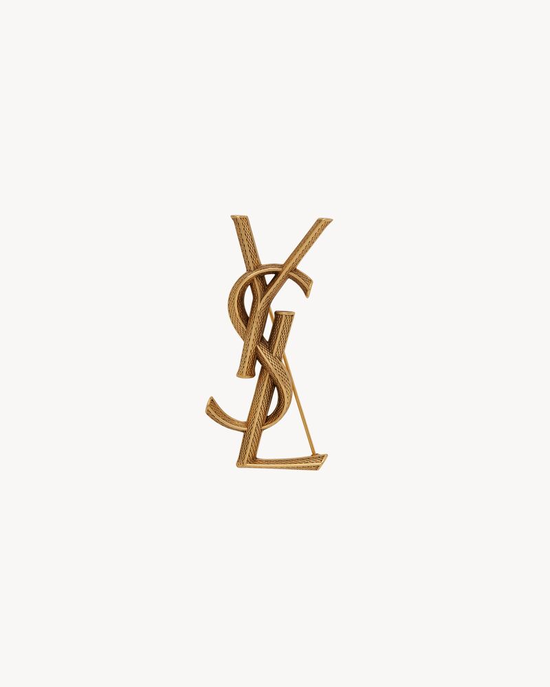 CASSANDRE snake brooch in metal, Saint Laurent