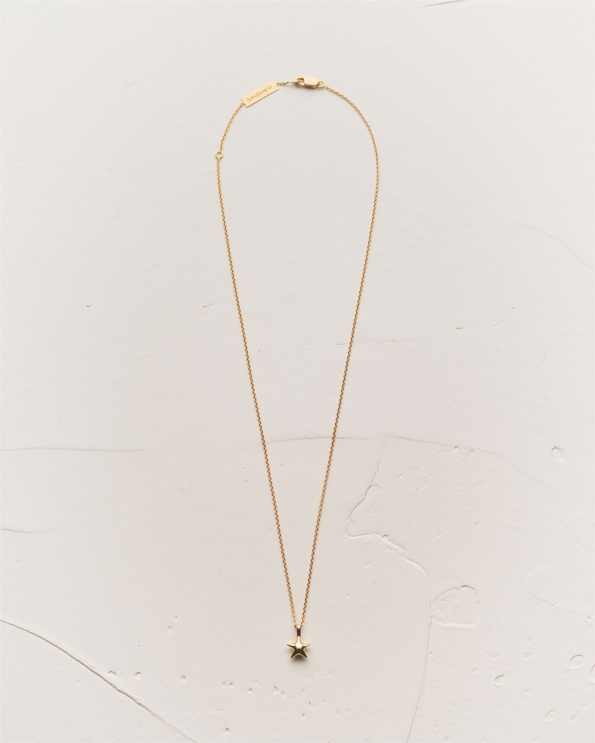 star pendant necklace in 18K yellow gold in Gold Saint Laurent