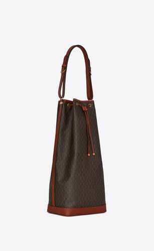 le monogramme long bucket bag in cassandre canvas and smooth leather