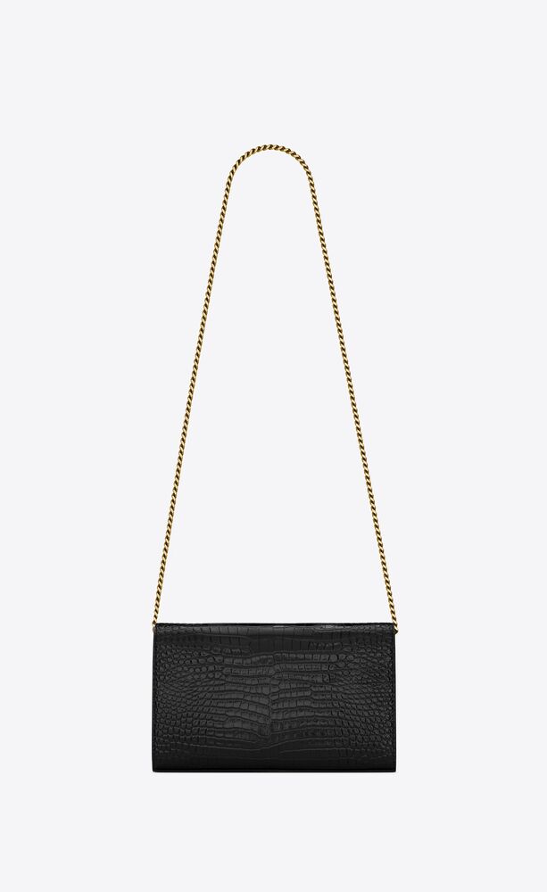 CASSANDRE chain wallet in crocodile-embossed shiny leather | Saint