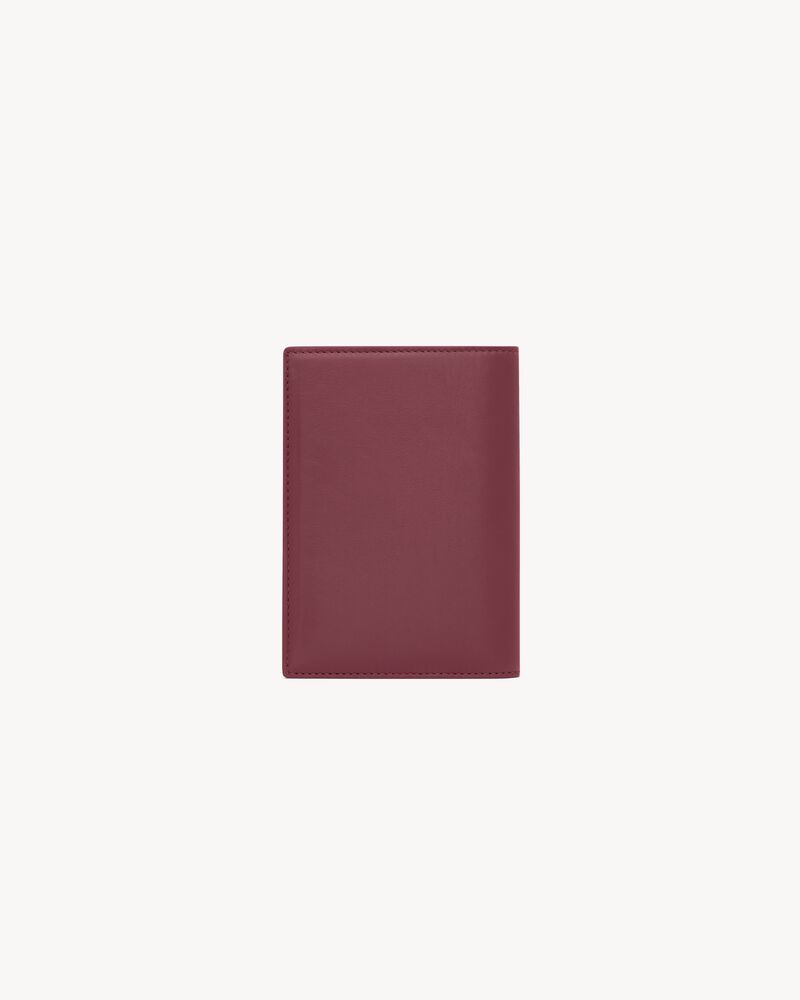 SAINT LAURENT PARIS PASSPORT CASE IN shiny leather