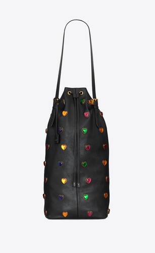 riva large bucket bag in vintage leather and heart-shaped studs