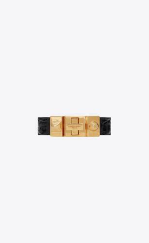 studded closure bracelet in crocodile-embossed leather and metal