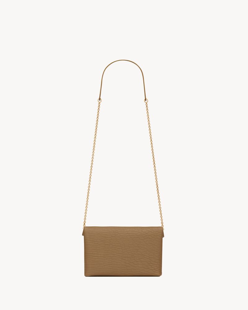CASSANDRE chain clutch in lambskin
